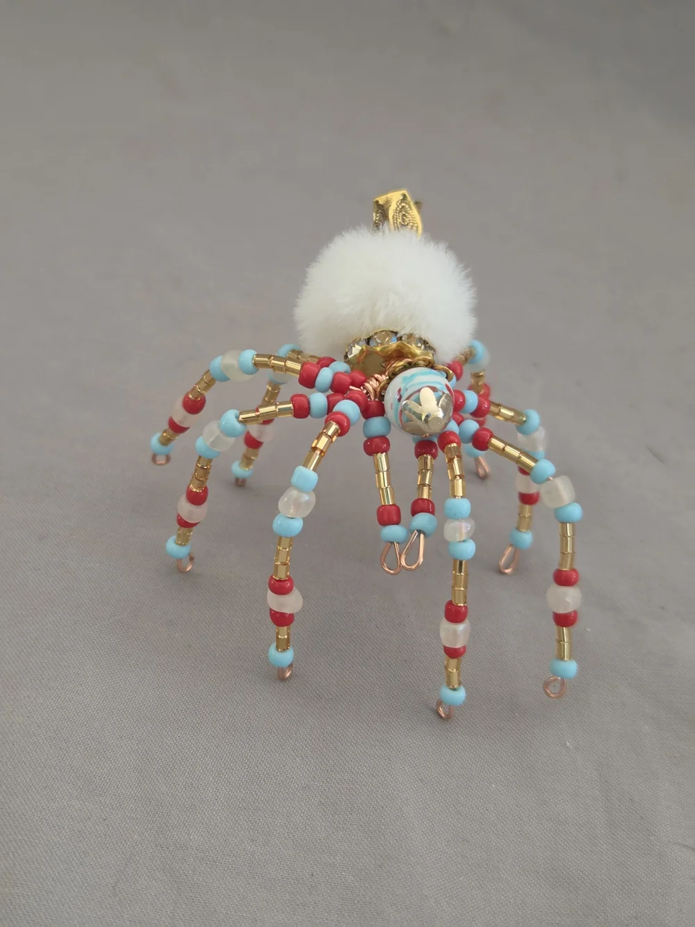 Beaded Spide with White Fur Accent